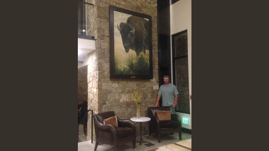Aaron Yount with Bison Painting at Hotel Jackson